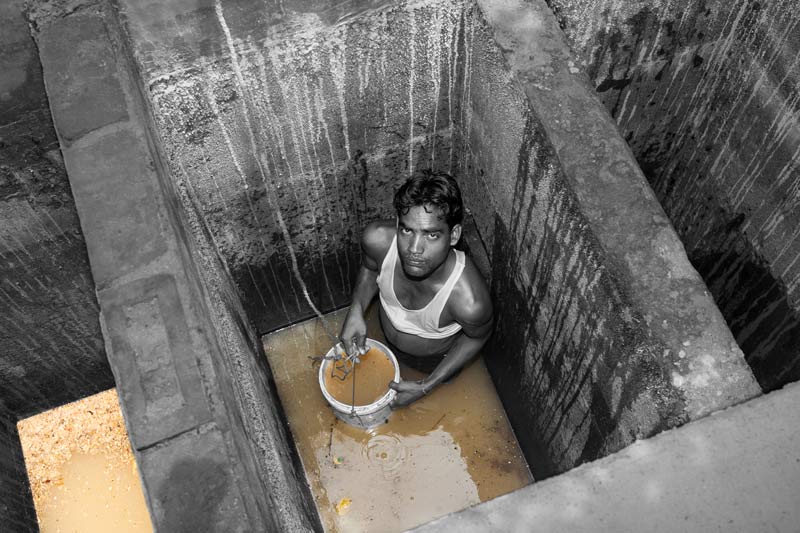 A septic tank being manually emptied out in Bareilly, Uttar Pradesh